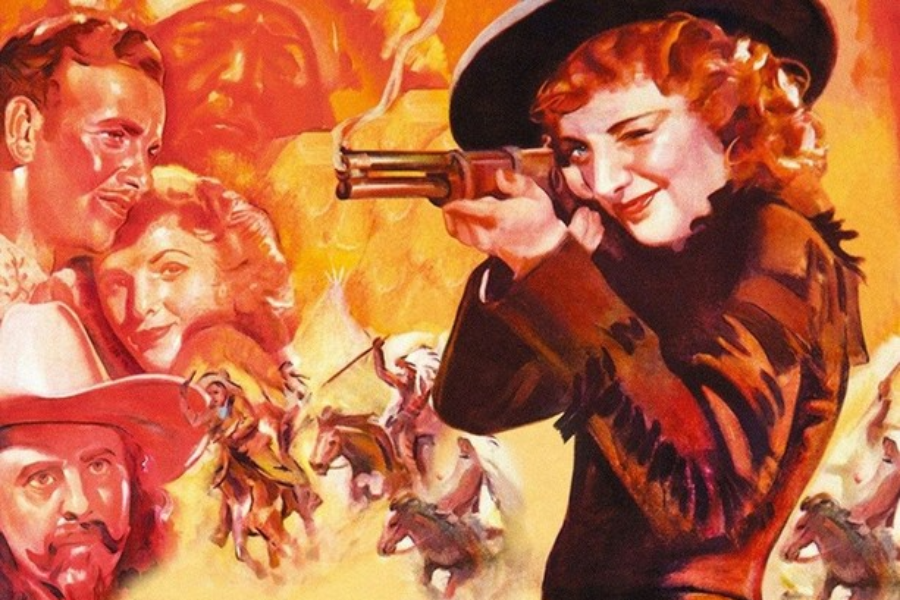 Vibrant illustrated poster featuring a smiling red-haired woman in a Western outfit and black hat aiming a smoking rifle while winking. Surrounding her are painted scenes of galloping horses, Native American warriors, and the faces of other characters, evoking classic Wild West drama and adventure.