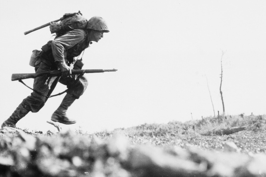 soldier running in an open field