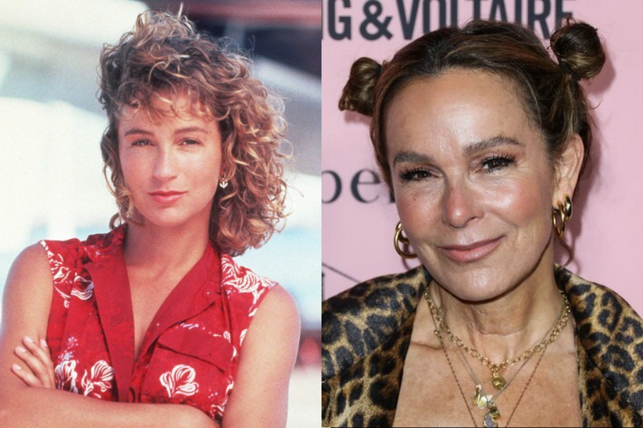 Side-by-side portraits of a woman over time. On the left, she is younger with short curly hair, wearing a red sleeveless button-up blouse with white floral prints, arms crossed and giving a confident look. On the right, she is older with space buns, wearing hoop earrings, layered gold necklaces, and a leopard-print jacket, smiling against a pink event backdrop.