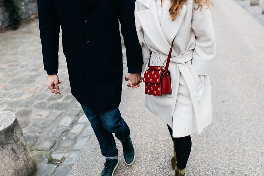 Couple holding hands